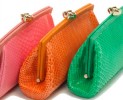 Le clutch luxury in pitone e struzzo di Desmo